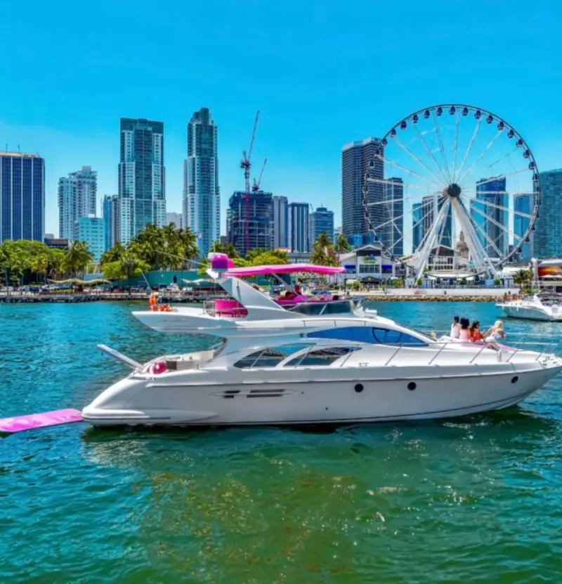 Pink yacht with Miami skyline